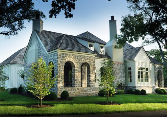 Exterior view of a Mossy Ridge eco-friendly home in suburban Nashville, featuring a blend of traditional architecture with sustainable, natural materials.